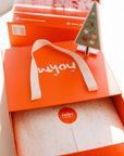 Nohm store gift packaging christmas gift kids pyjamas from Dubai.