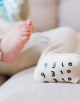 Ramly or beige baby pyjama from Nohm store, stylish and soft Arab-inspired nightwear for children and gifts from Dubai.