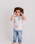 Huroof t-shirt from Nohm store, Arabic letter-inspired stylish t-shirt, perfect for children and gifts from Dubai.
