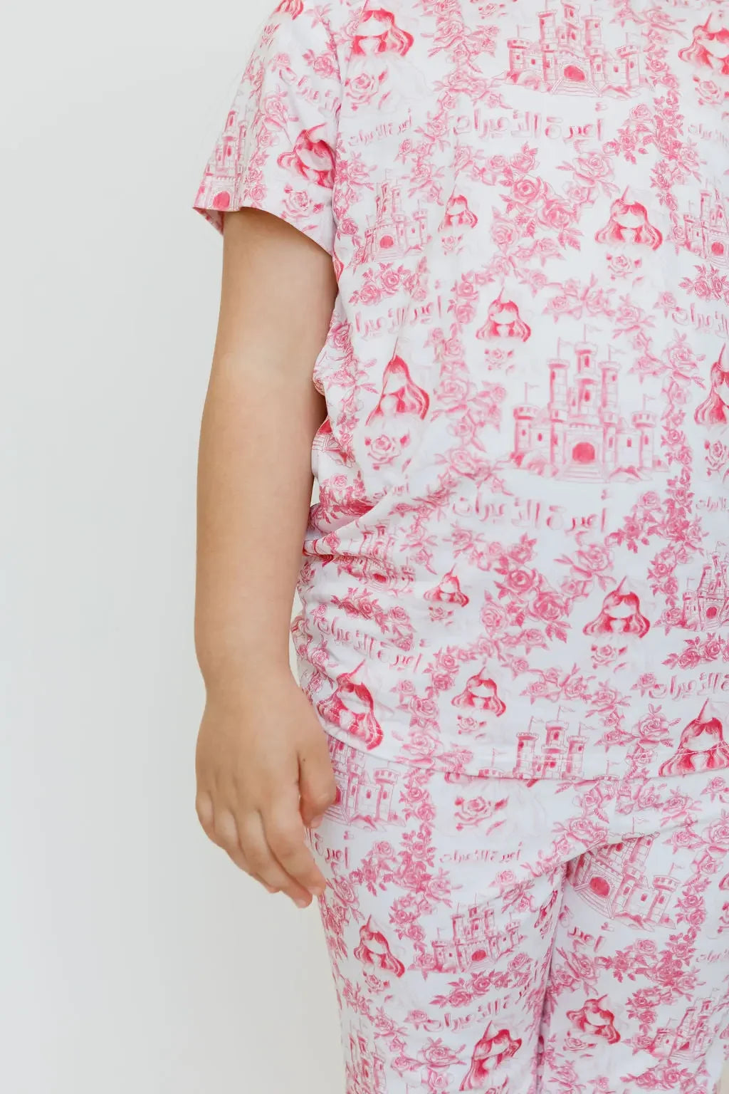 A close-up of our Amira Short Sleeve Pyjama, featuring delicate princess and castle prints for a dreamy bedtime look.
