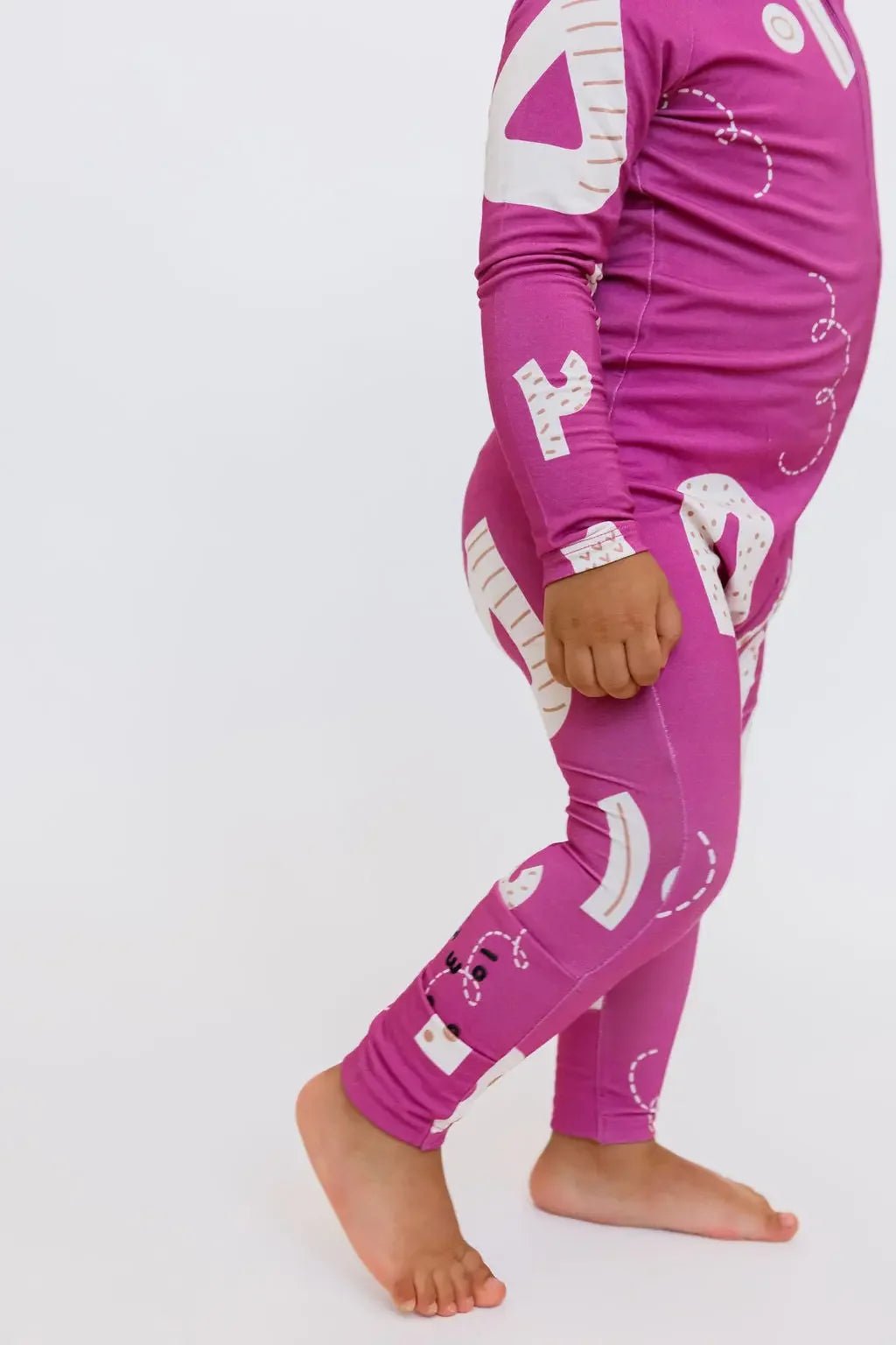 A close-up of our Arqam Smart Baby Pyjama, showcasing the bold Arabic number designs that make learning fun and stylish.