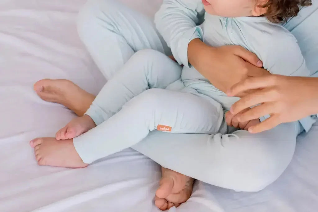 Matching moments in our Reef Pyjamas — soft, breathable, and designed for cozy cuddles and sibling bonding.