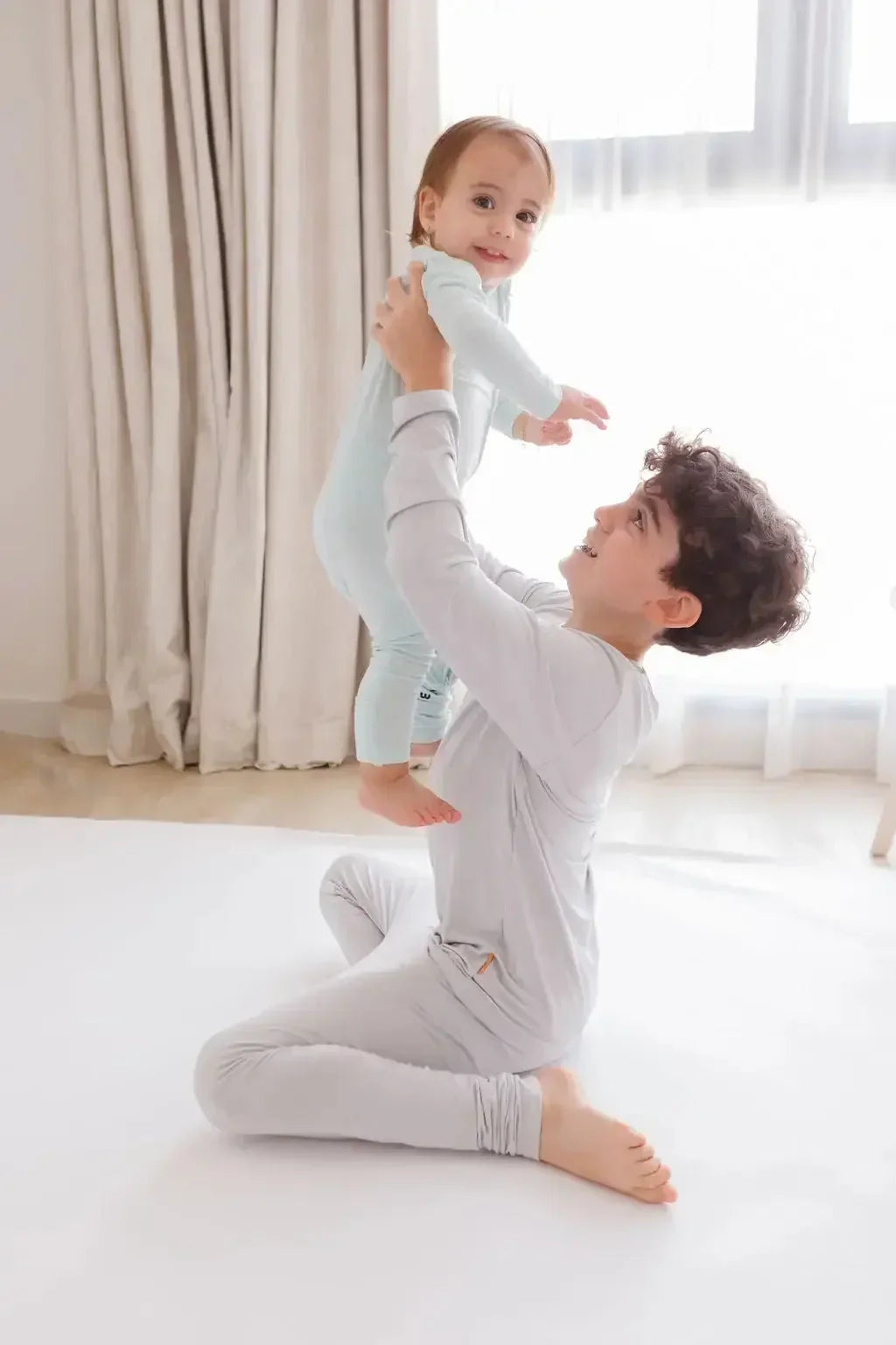 Reef baby onesie and ramady kids long sleeve pyjama from Nohm store, cozy and stylish Arabic sleepwear, ideal for children and gifts from Dubai.