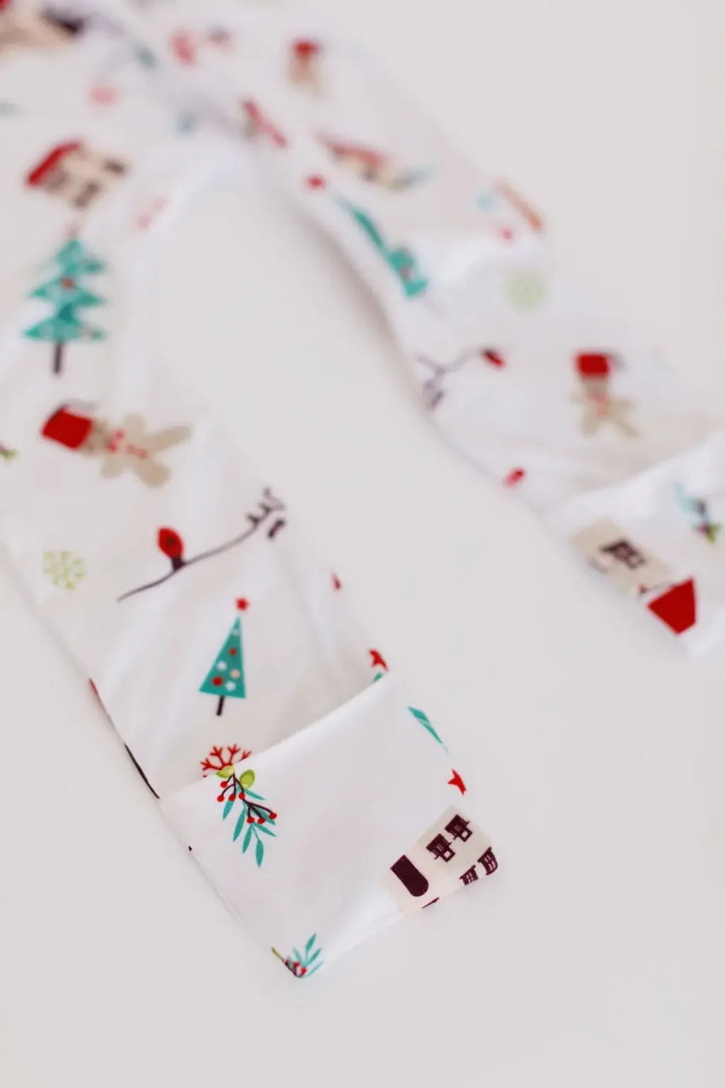 Christmas baby pyjama from Nohm store, festive and cozy Arabic heritage sleepwear for children, perfect gifts from Dubai.