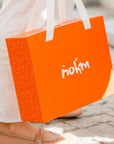 Nohm store gift packaging for kids and baby clothes gifts from dubai.