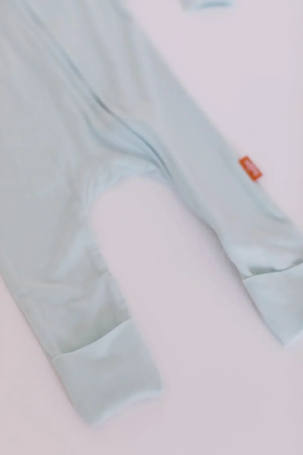 Close-up of the Reef baby pajama set from Nohm store, showcasing soft cotton fabric and comfortable design for newborns.