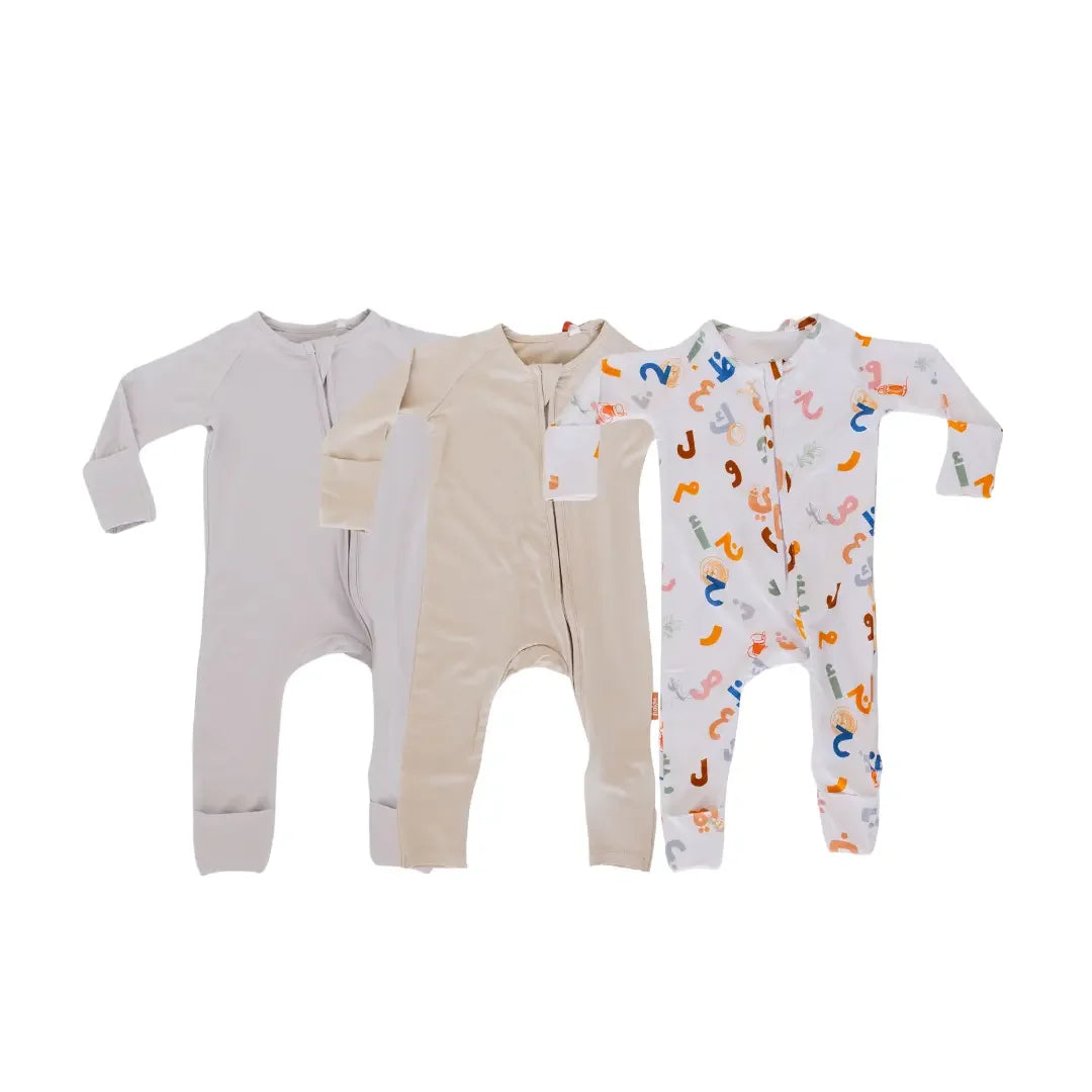 Huroof baby pyjama from Nohm store, Arabic letter-inspired pyjama, perfect for children and baby gifts in Dubai.