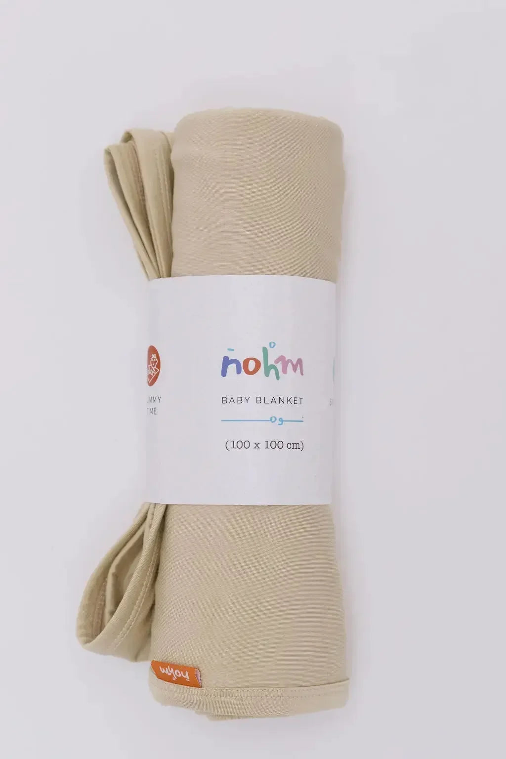 The **Ramly Baby Blanket** from the **Neutral Nohm Gift Box**, a beige double-layered bamboo blanket measuring 100 x 100 cm, crafted for softness, breathability, and everyday comfort.
