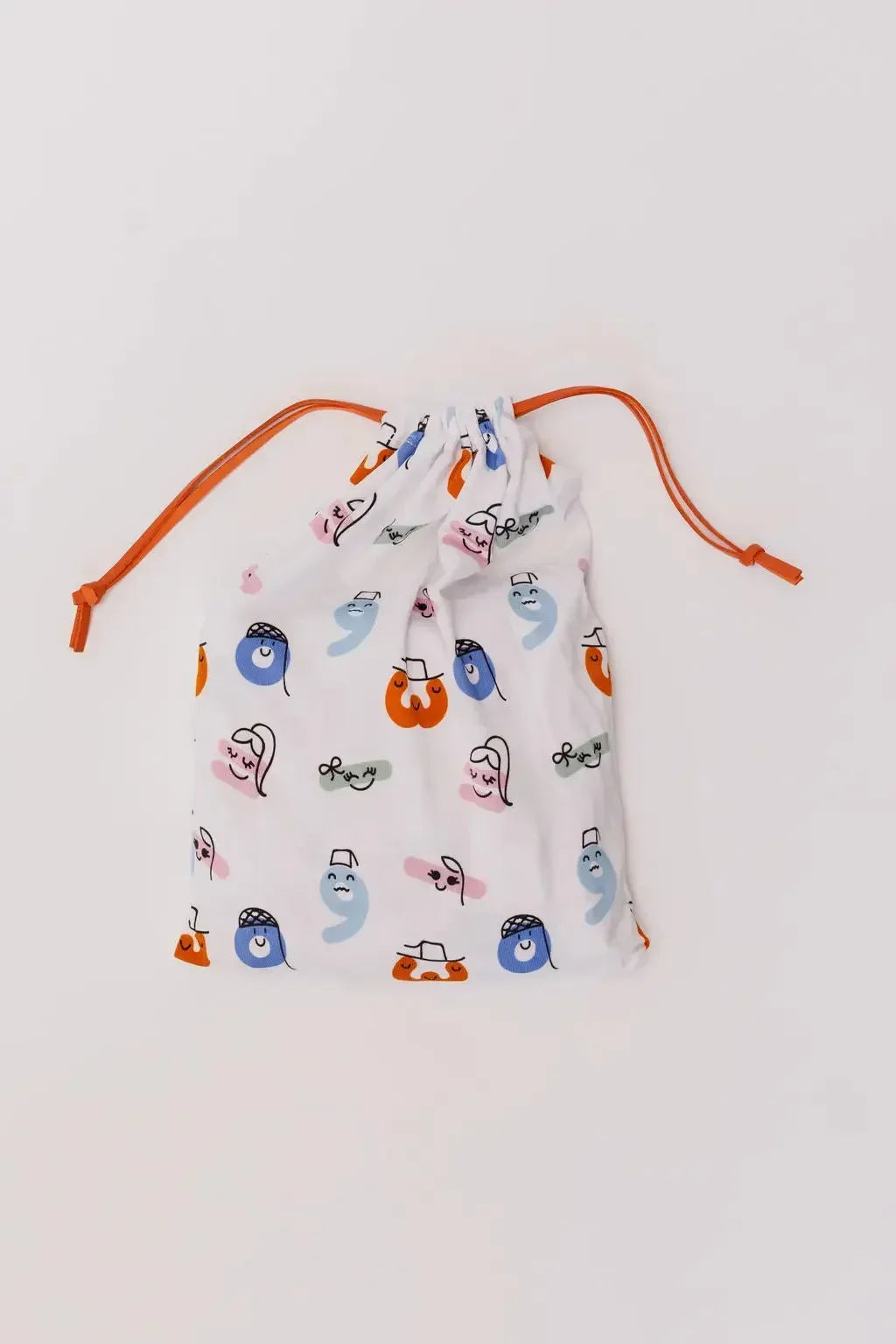 Our Nohm Tanween Bedding Set, neatly packed in its playful Arabic-patterned drawstring bag — where comfort meets cultural charm.