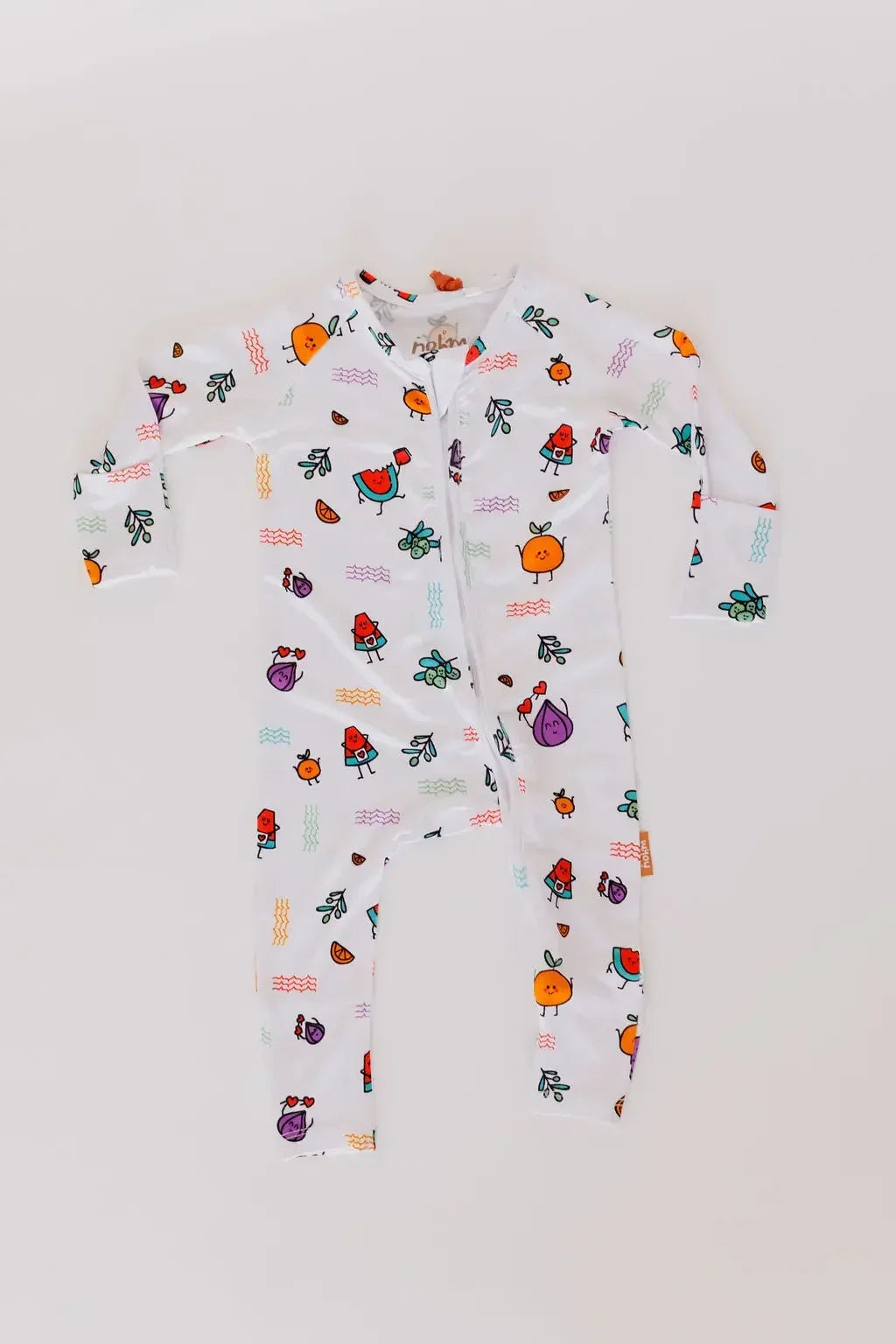 The **Watermelon Pyjama** from the **Watermelon Bundle**, a white one-piece featuring colorful watermelon and fruit illustrations for a playful, vibrant design.