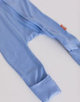 A close-up of the **Bahry Pyjama** from the **Watermelon Bundle**, highlighting its soft light-blue bamboo fabric and foldable foot cover for adjustable comfort.
