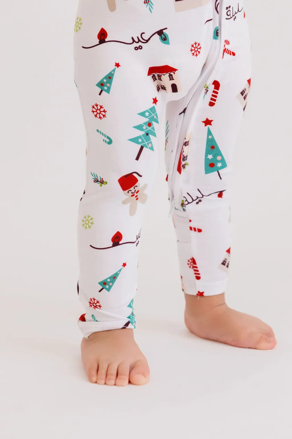 Christmas baby pyjama from Nohm store, festive and cozy Arabic heritage sleepwear for children, perfect gifts from Dubai.