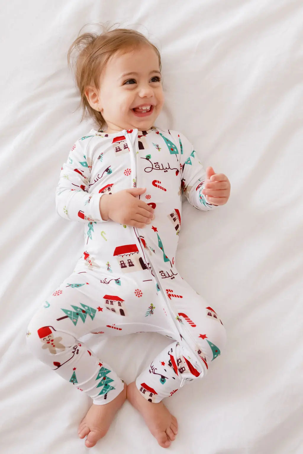 Christmas baby pyjama from Nohm store, festive and cozy Arabic heritage sleepwear for children, perfect gifts from Dubai.