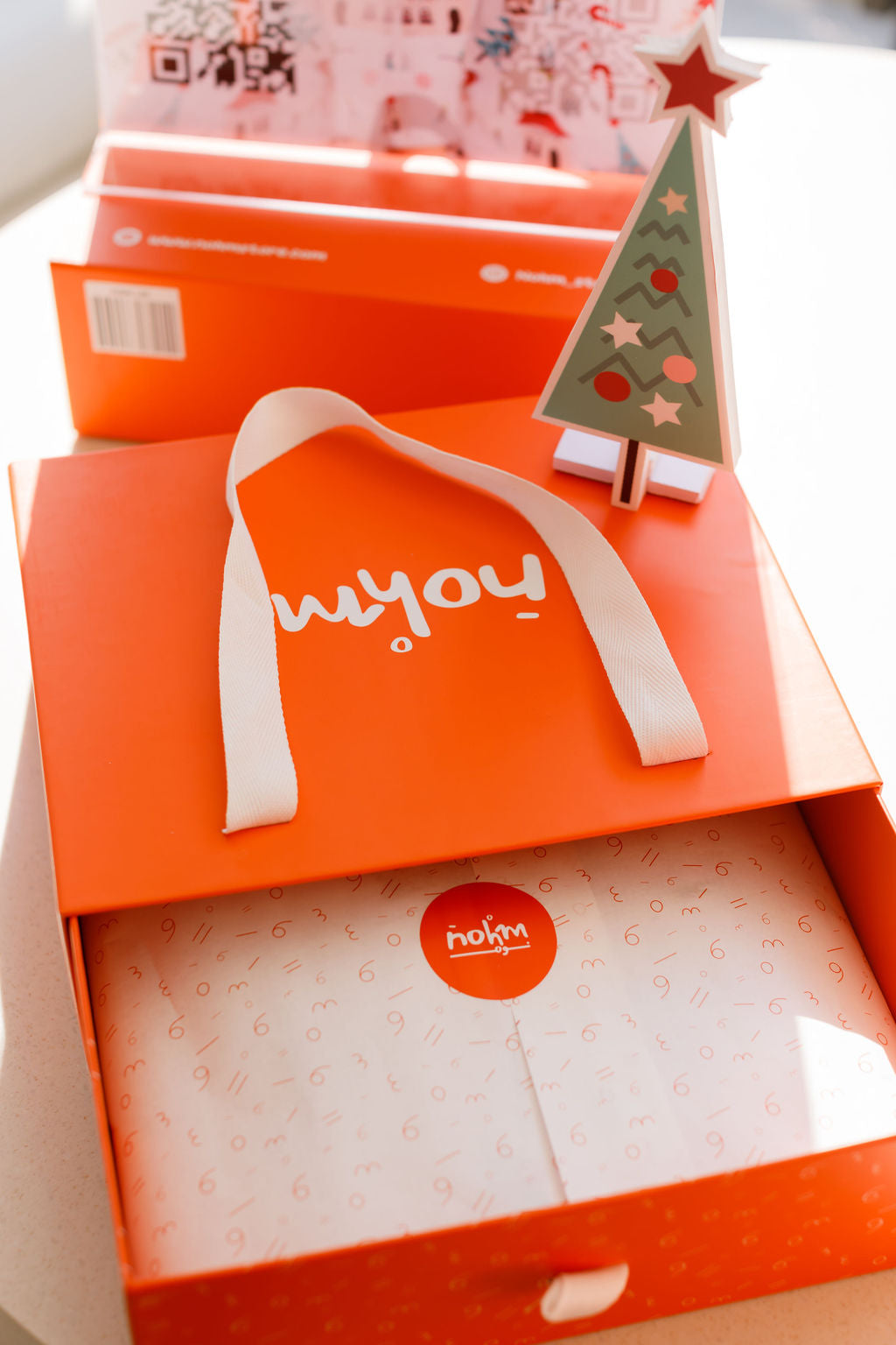 Nohm store gift packaging christmas gift kids pyjamas from Dubai.