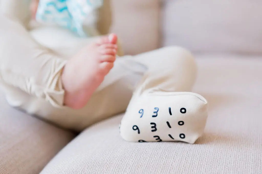 Ramly or beige baby pyjama from Nohm store, stylish and soft Arab-inspired nightwear for children and gifts from Dubai.