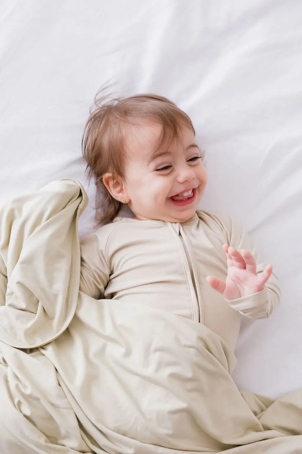 Ramly or beige baby pyjama from Nohm store, stylish and soft Arab-inspired nightwear for children and gifts from Dubai.